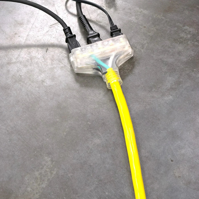 Three Power Cords Plugged Into The DuroMax 25-Foot 10 Gauge Triple Tap Extension Power Cord