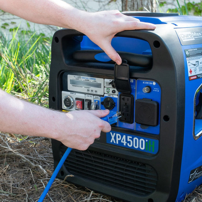 Plugging An XPX12100A Heavy Duty 100-Foot 12 Gauge Power Cord Into A DuroMax Generator