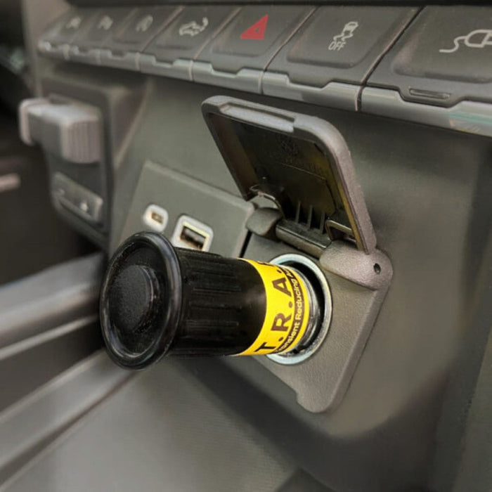 Faraday Defense T.R.A.P. EMP Vehicle Protection Plugged Into A Car Cigarette Lighter Close Up