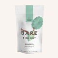 Bare Biology Pure DHA Omega-3 Capsules have minimalist packaging with an illustration of a woman with tree-like hair, symbolising mindfulness. The pack contains 30 capsules and is made from 100% plastic-free materials.