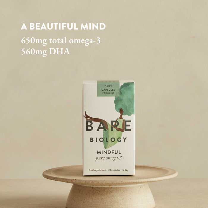 Box of Bare Biology Mindful pure omega-3 supplement on a wooden stand with a beige background