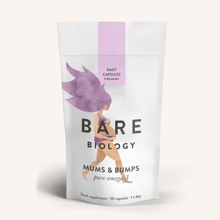 One white pouch of Bare Biology Mums & Bumps Omega-3 Fish Oil Capsules for Pregnancy, featuring an illustrated woman with pink hair, highlighting DHA for developing babies and containing a label for daily capsules.