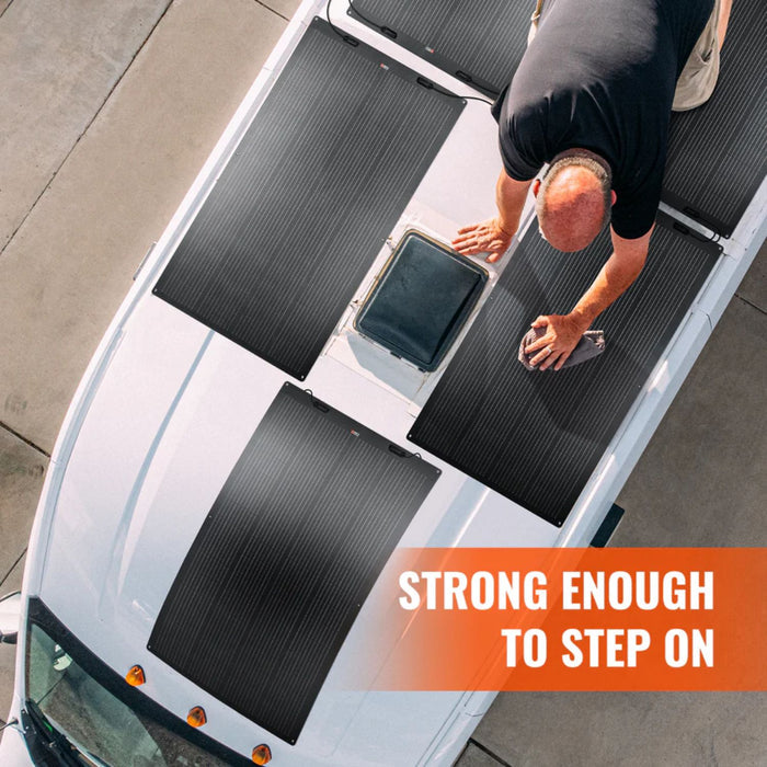 Person standing on a car with Rich Solar MEGA 200 FLEX PRO Solar Panel